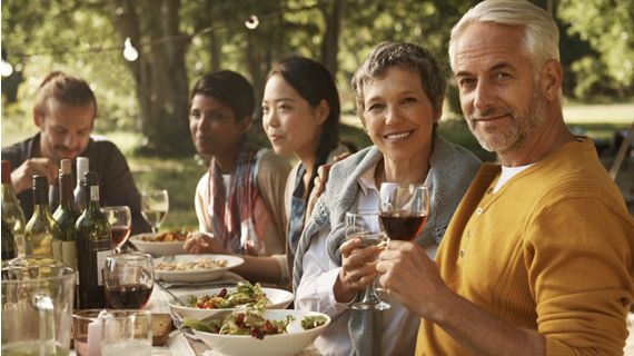 diverse group drinking wine