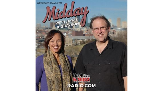Promotional image for Midday with Jayme & Grayson airing weekdays 10 to 12 pm on 98.1 FM KMBZ and Radio.com, featuring the hosts smiling against a city skyline.