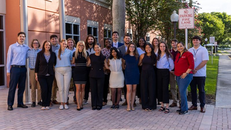 Interns outside of Southern Glazer's location