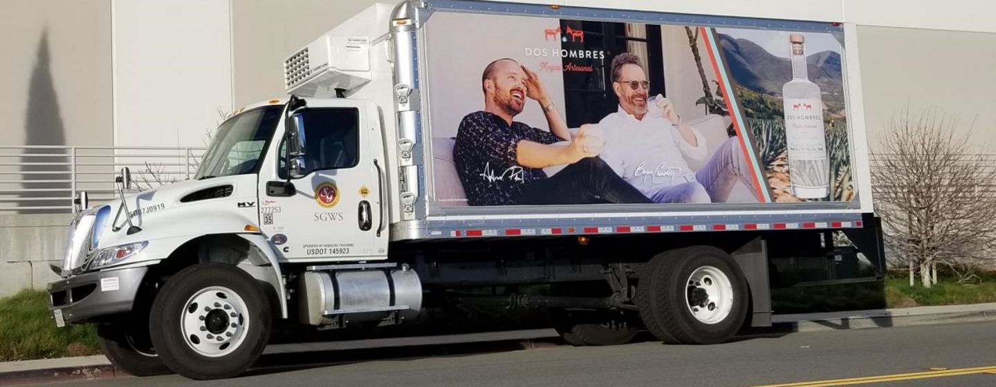 Truck with alcoholic beverage advertisement