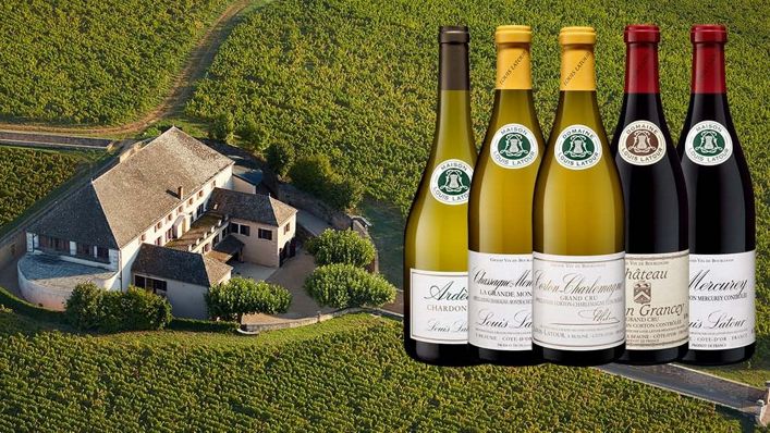 An aerial view of the prestigious Louis Latour winery surrounded by lush vineyards, alongside a selection of their renowned white and red wines.