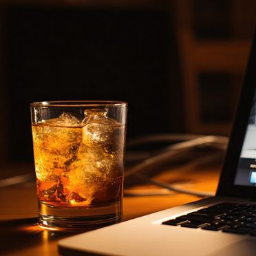 A cocktail sitting on top of an open laptop computer, in the style of cocktail photography. --chaos 40 --ar 9:16 --profile lmjbna4 --v 7 Job ID: 93cb08f2-4031-4ece-bd0e-e18d84b25068